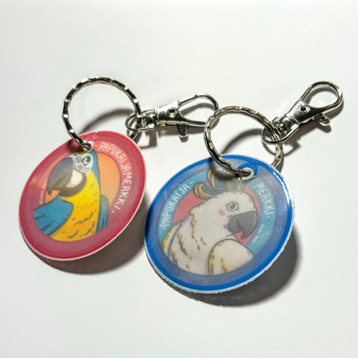 PIKKUVIKAINEN: Papukaijamerkki-heijastin Kakadu