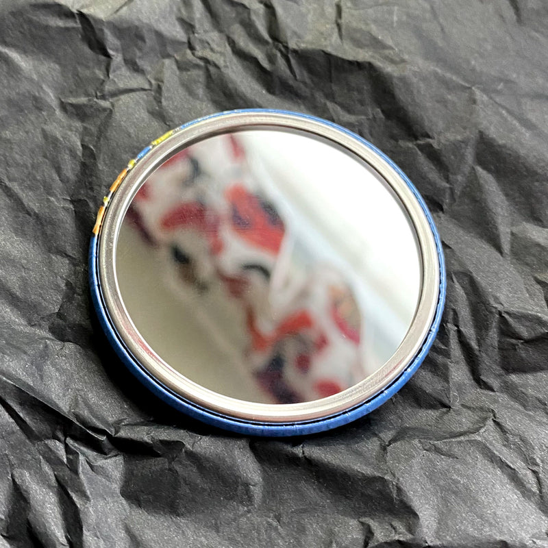 Papukaijamerkki taskupeili - erilaisia